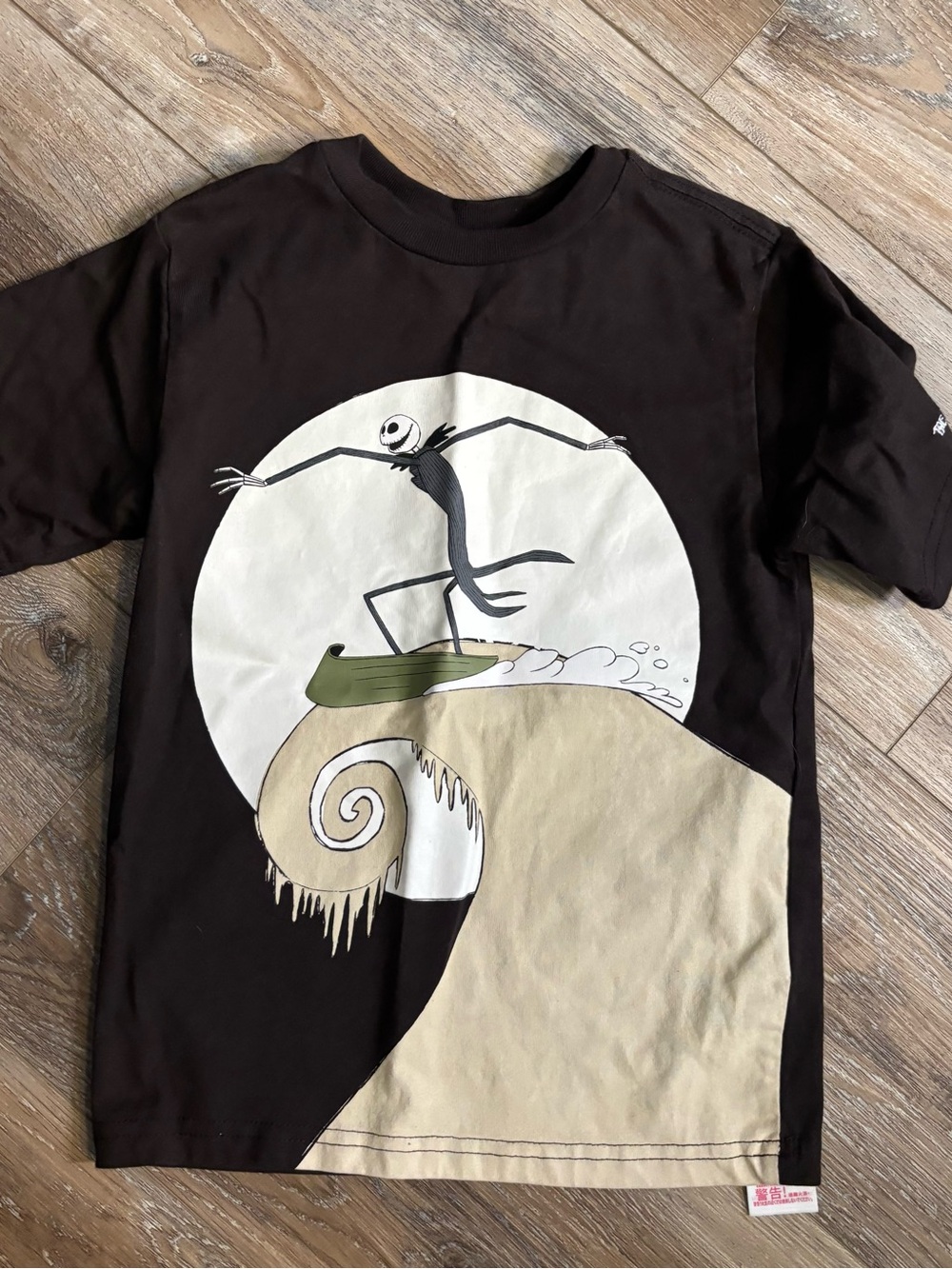 Disney The Nightmare Before Christmas Brown Tee with Cream & Green Surf Graphic